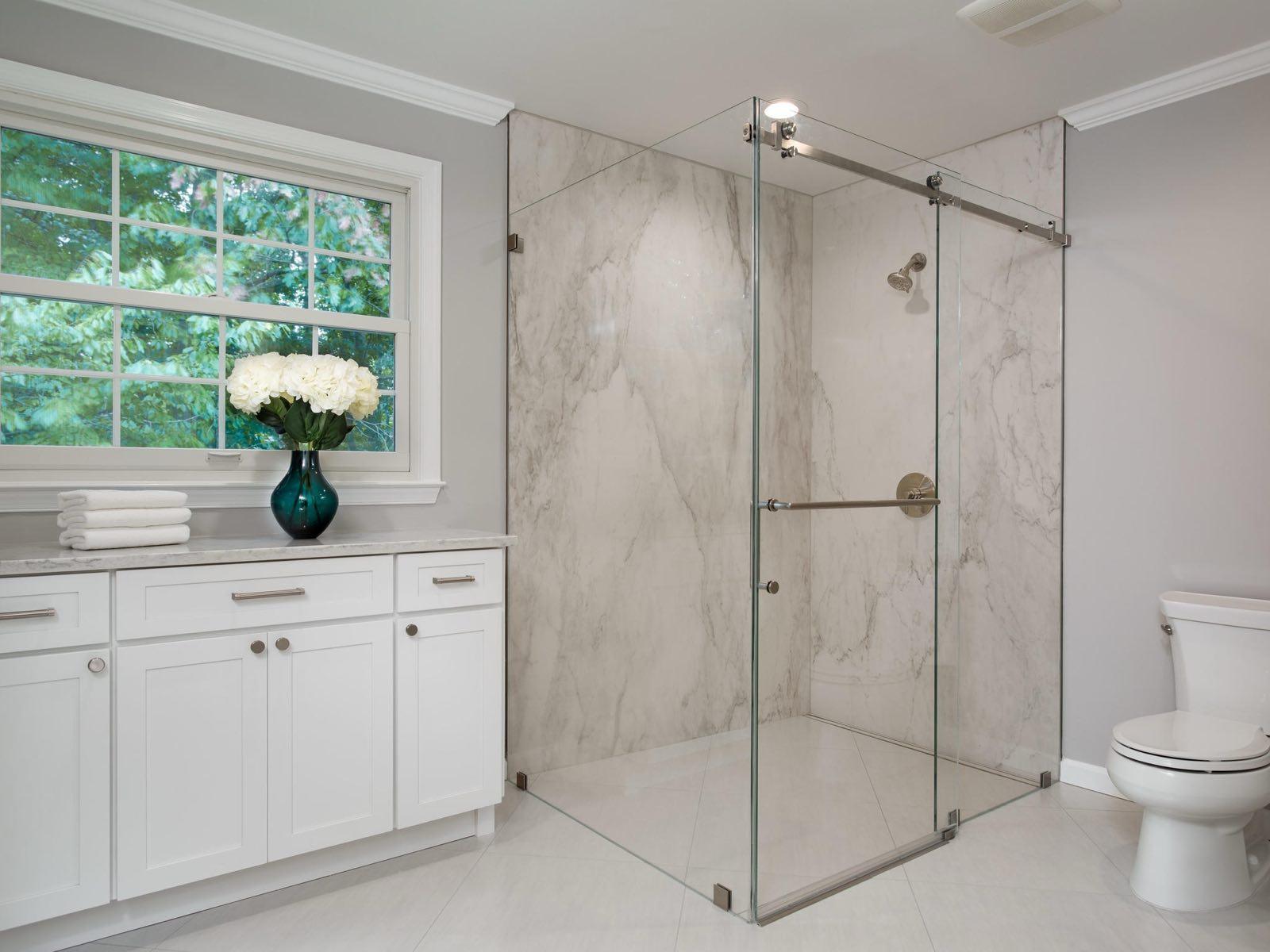 Close-up of handmade ceramic wall tile with contrasting grout and recessed niche in a Seattle bathroom remodel