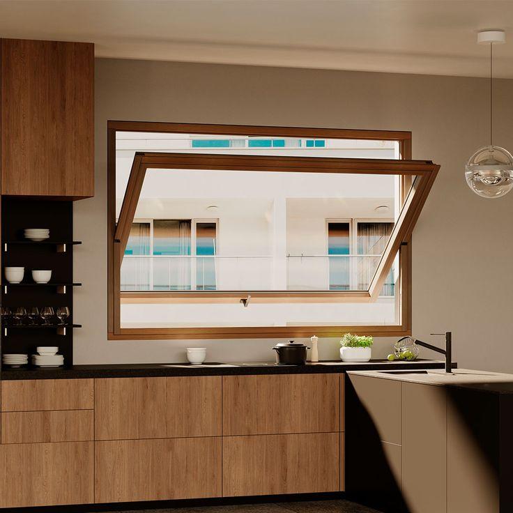 Wood-framed window tilted open above a kitchen counter with wood-grain cabinets